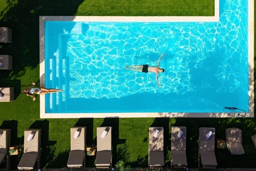 Отель Athenian Riviera Hotel & Suites 4*
