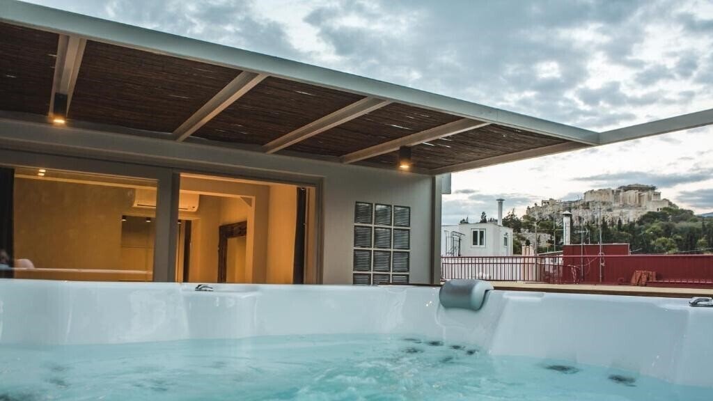 Фотографія Acropolis Luxury Apartments 5*