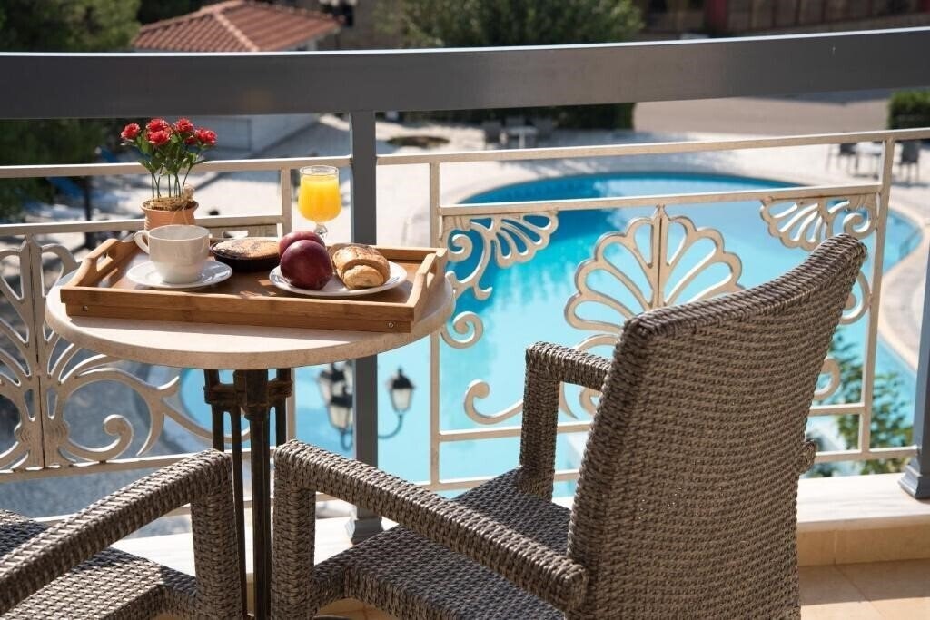 Фотографія Acharnis Kavallari Hotel Suites 3*