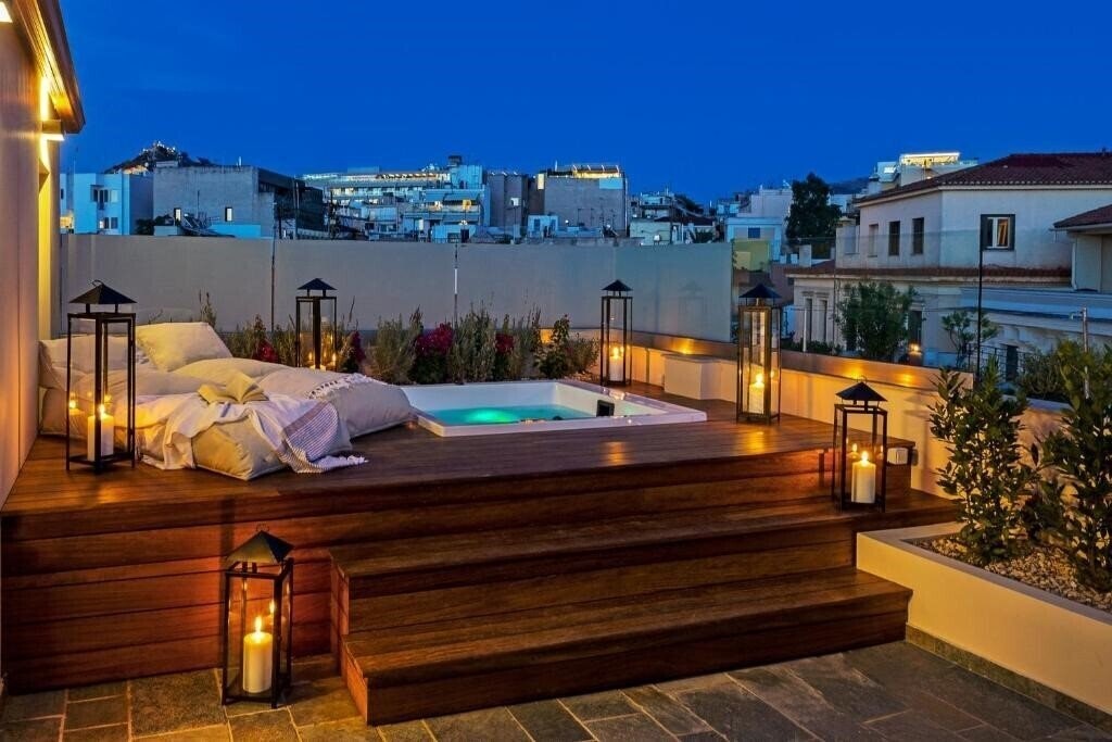 Фотографія A77 Suites By Andronis 4*