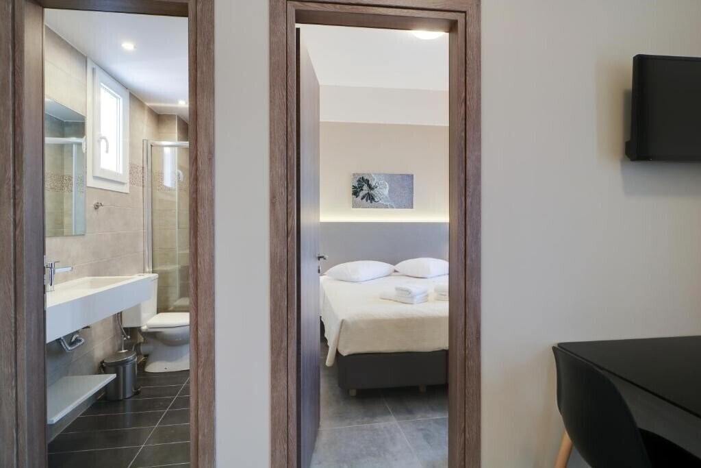 Фотографія Athens Comfort Suites & Apartments 4*