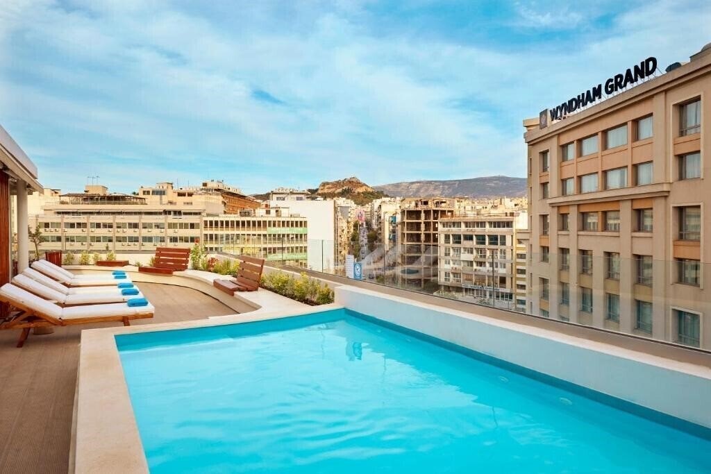 Фото Zeus Essence Wyndham Athens Residence 5*