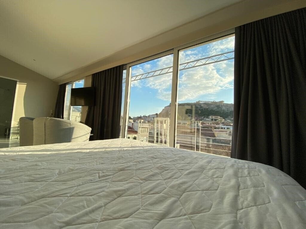 Фото 24k Athena Suites 3*
