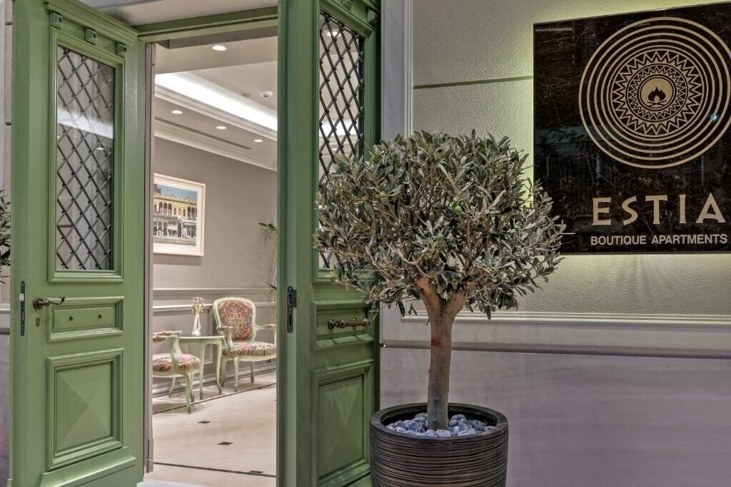 Фото Estia Boutique Apartments 4*