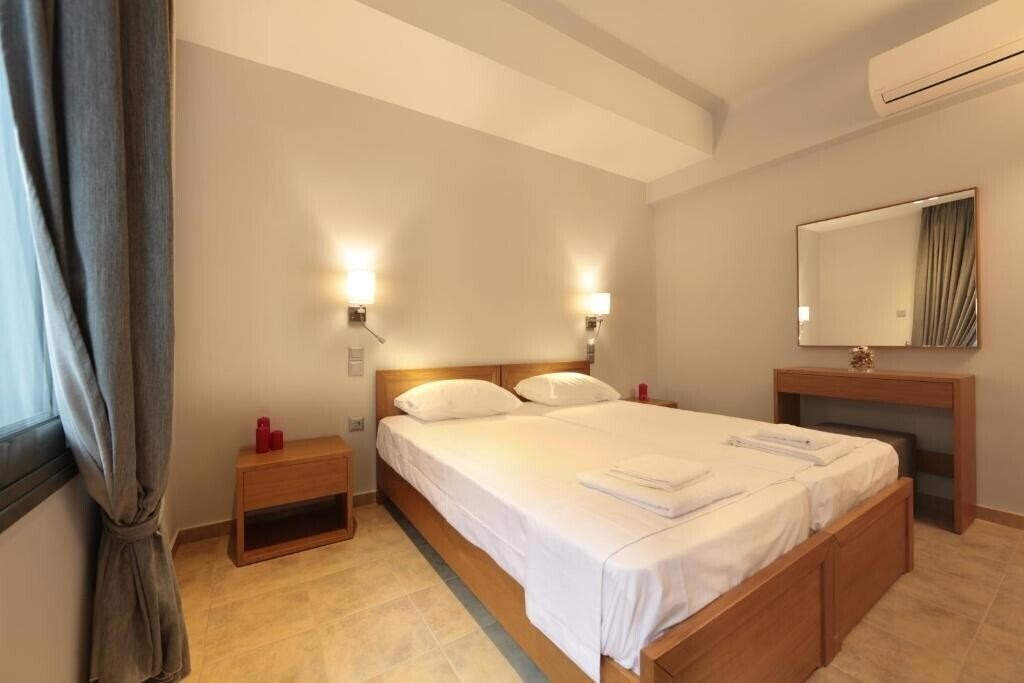 Готель Meni Apartments 4*