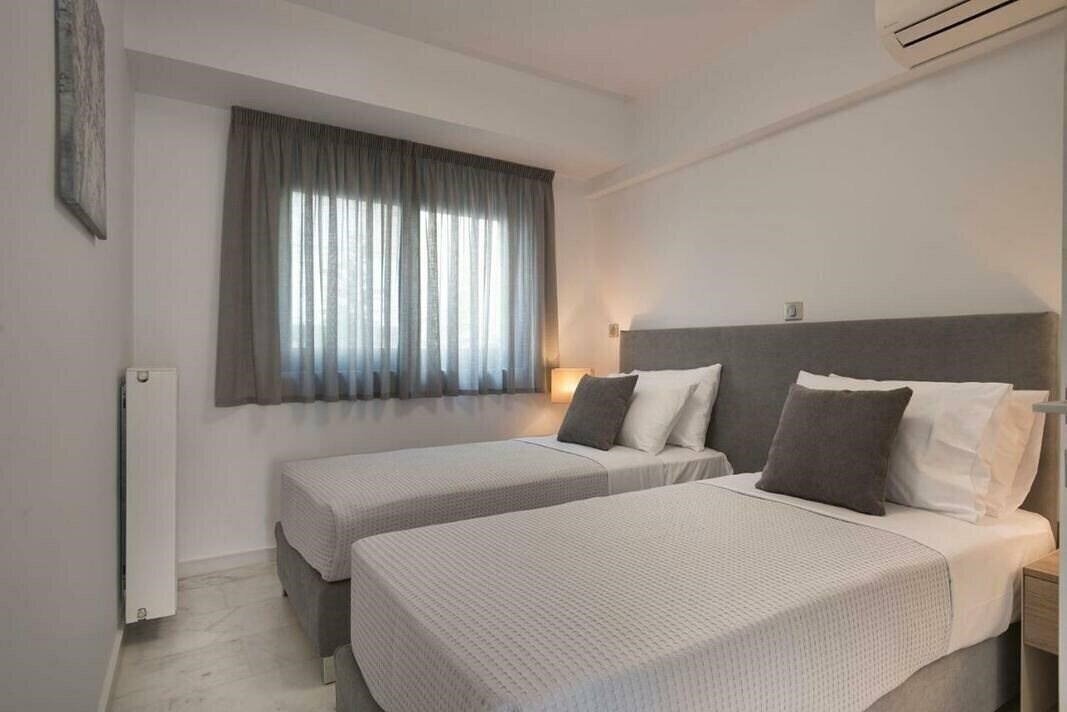 Изображение Petal Apartments 4*
