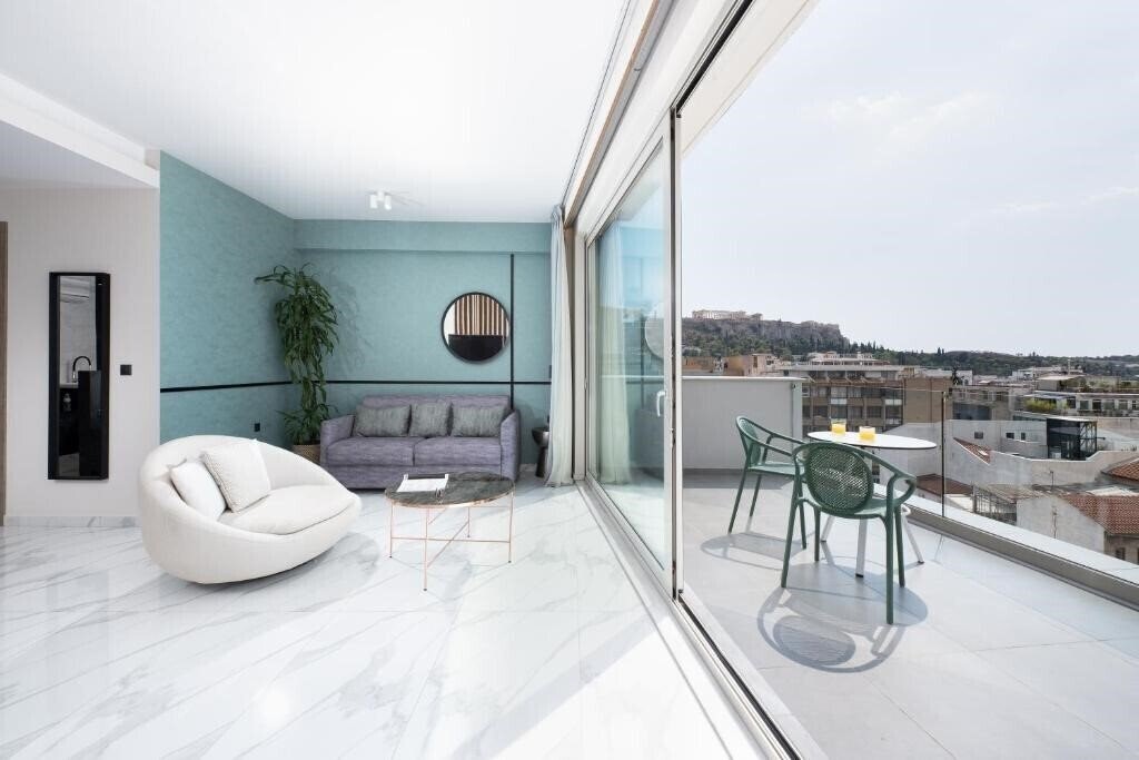 Отель The Athens Green Suites 4*