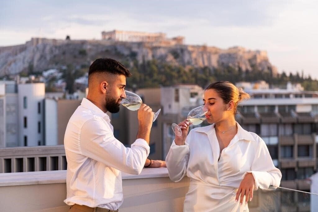 Фото The Athens Green Suites 4*