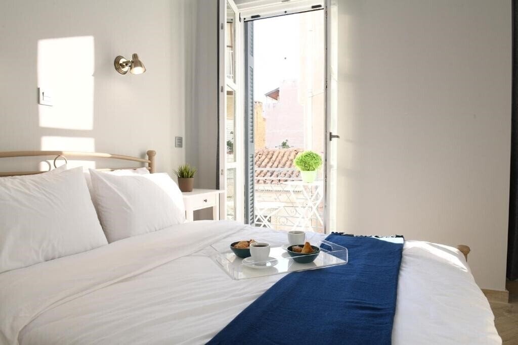 Фото Neapolis 1897 Boutique Hotel 4*