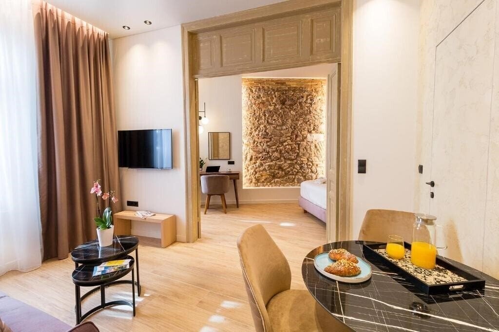 Отель Paleo Suites 4*