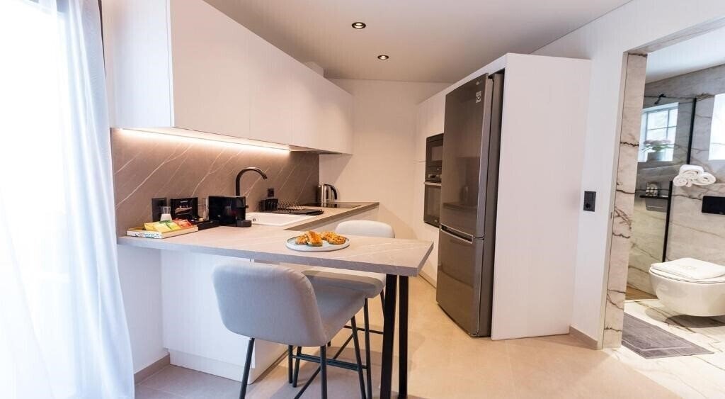 Фотография Paleo Suites 4*