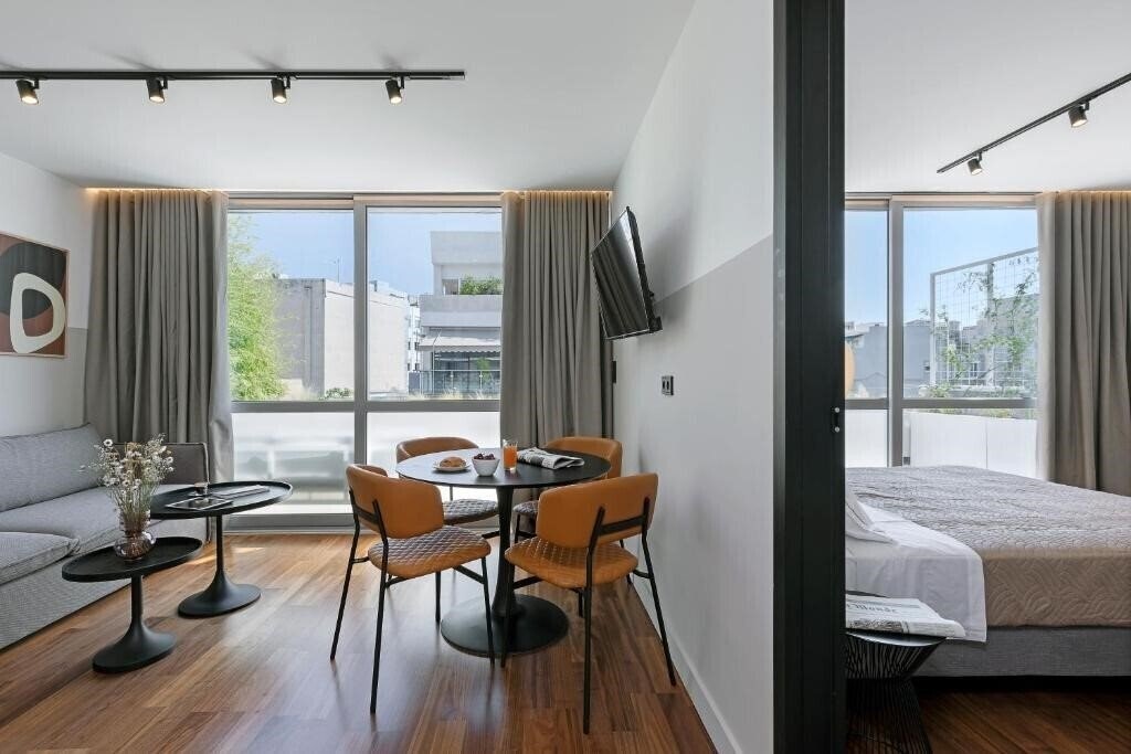 Фото The Athenians Art Apartments 4*