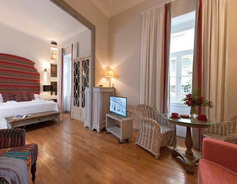Изображение Acropolis Townhouseco 4*