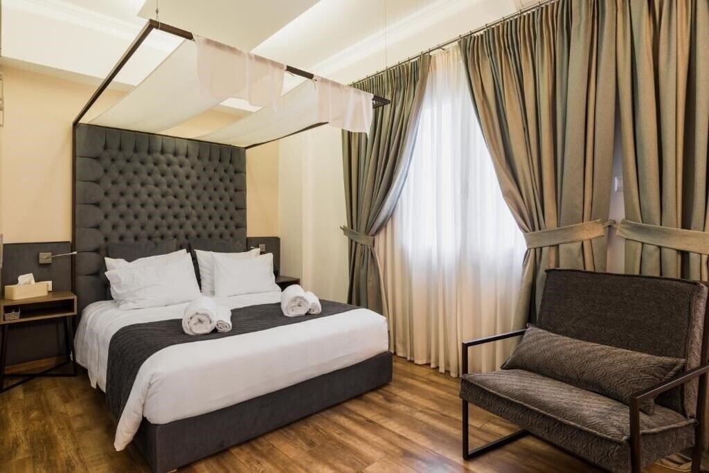 Изображение Acropolis Executive Suite 4*