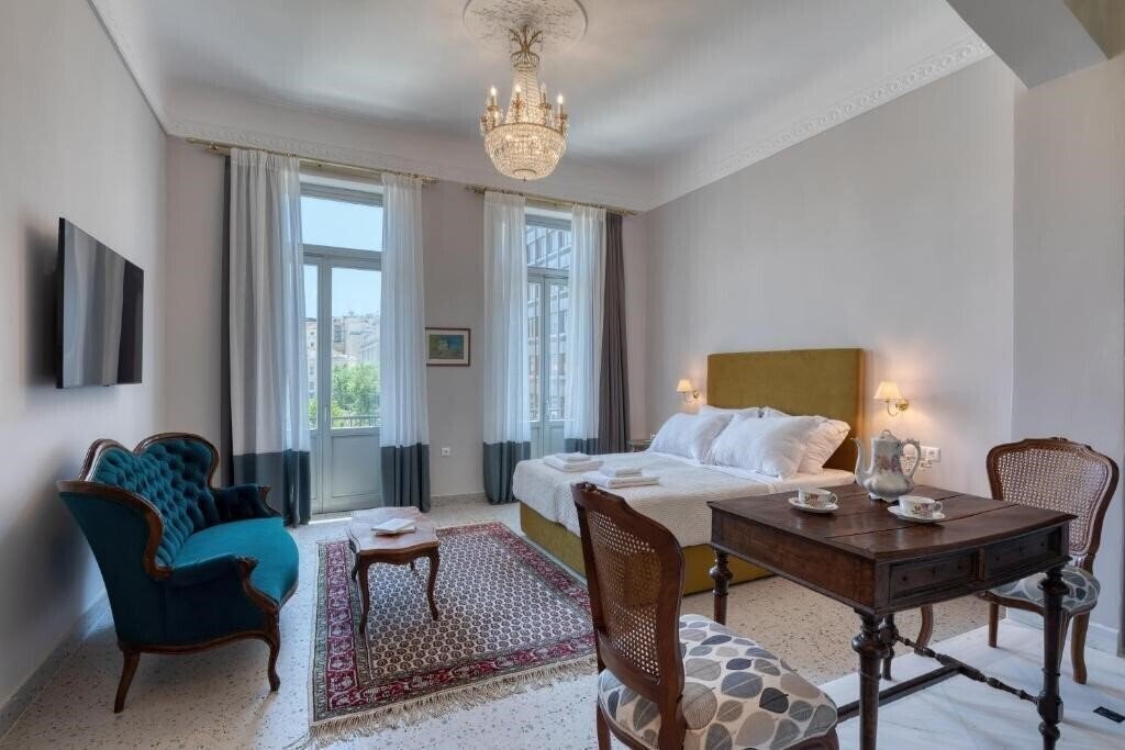 Фото Athenian Vintage Apartments 4*