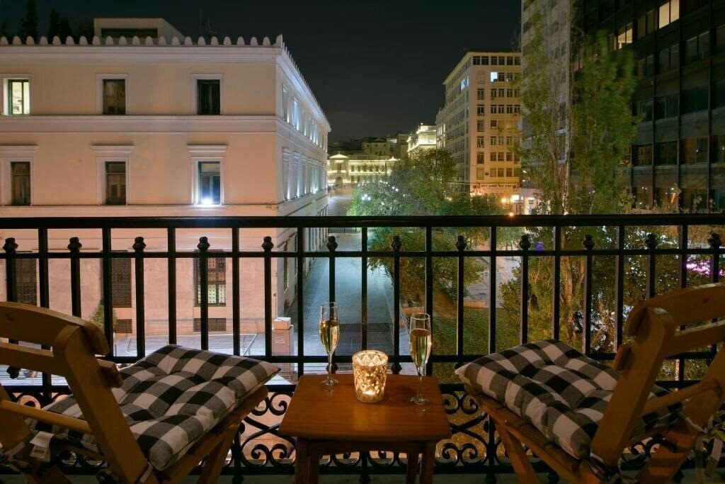 Фотографія Athenian Vintage Apartments 4*