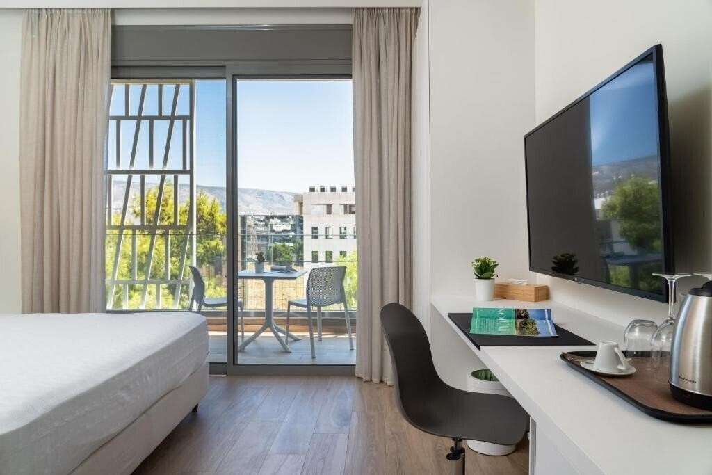 Отель Athens Hill Luxury Apartments 4*