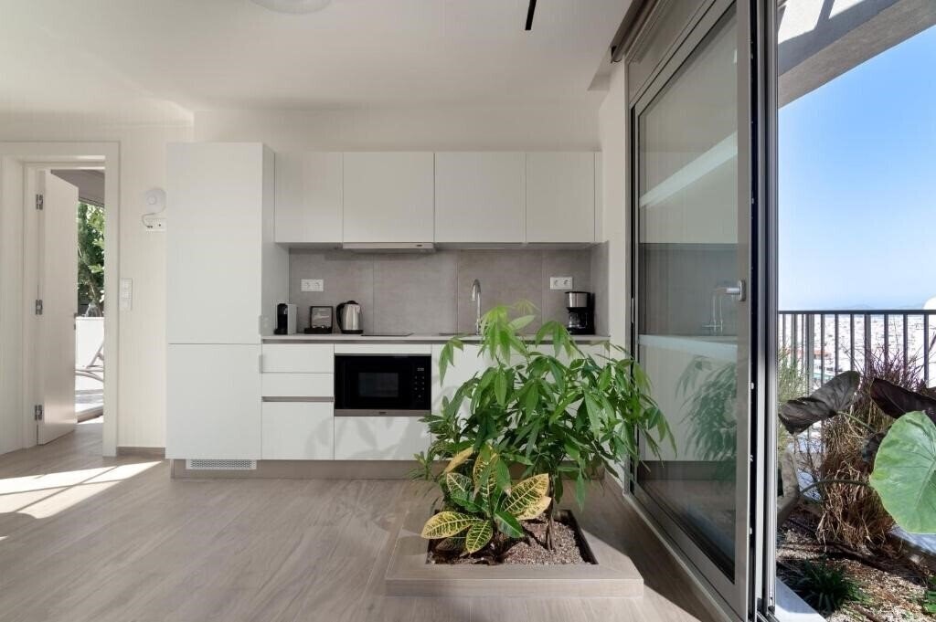 Фотография Athens Hill Luxury Apartments 4*