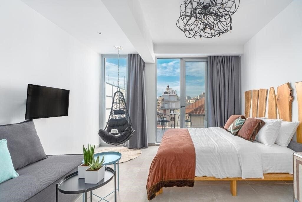 Фото Mythos Luxury Suites 4*