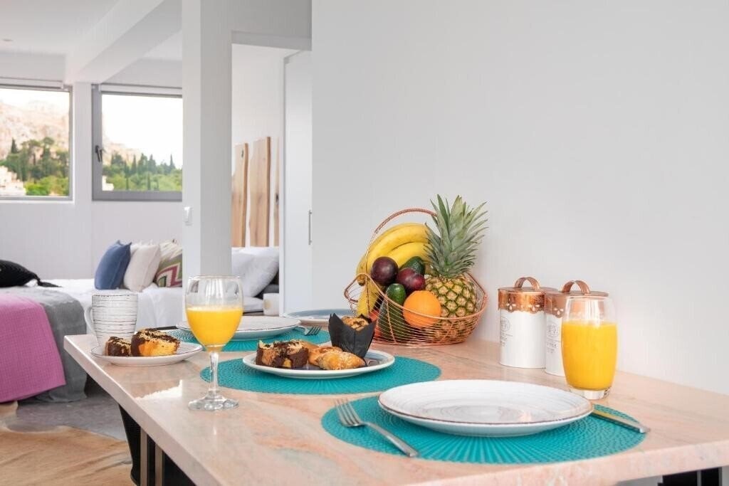 Фотографія Mythos Luxury Suites 4*