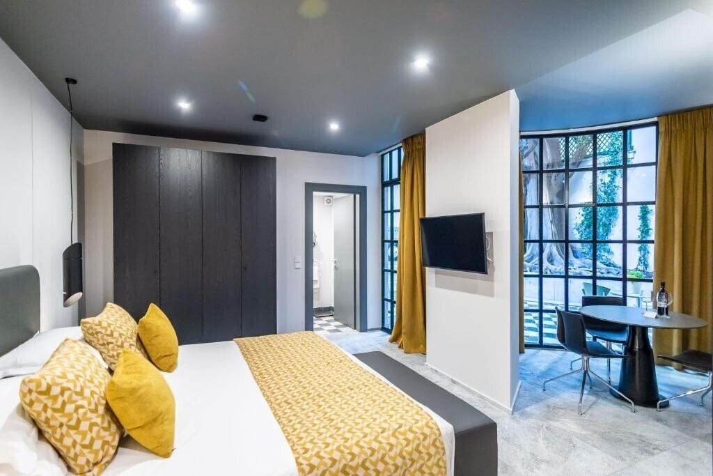 Фотографія 33 Solonos Suites 3*