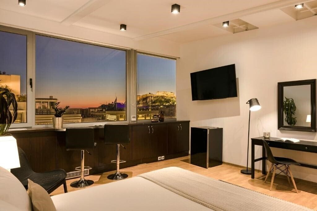 Отель Aria Acropolis Suites Troulanda 3*