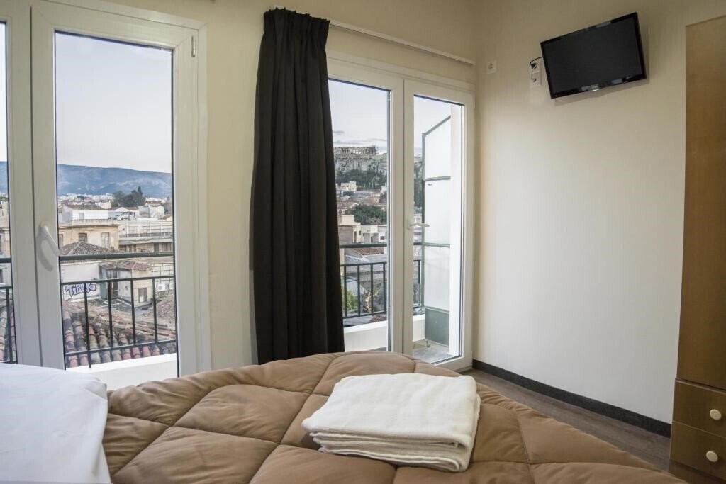 Отель Pella Inn Hostel 1*