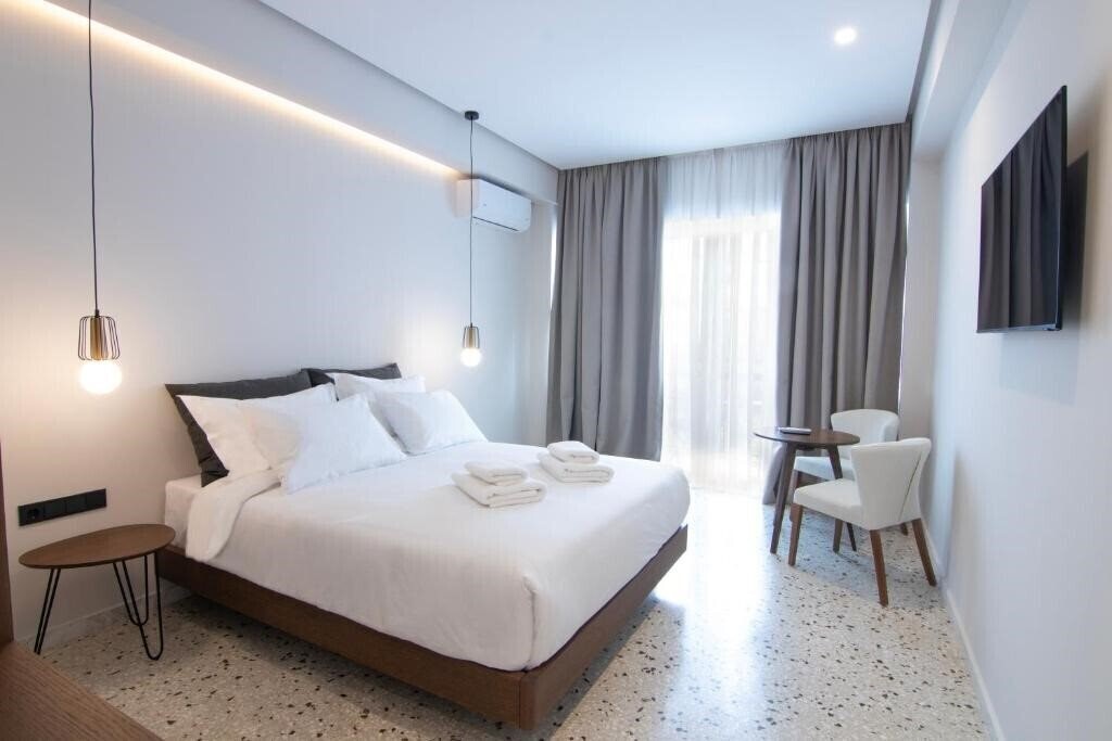 Отель Mythodea Athens Suites 3*