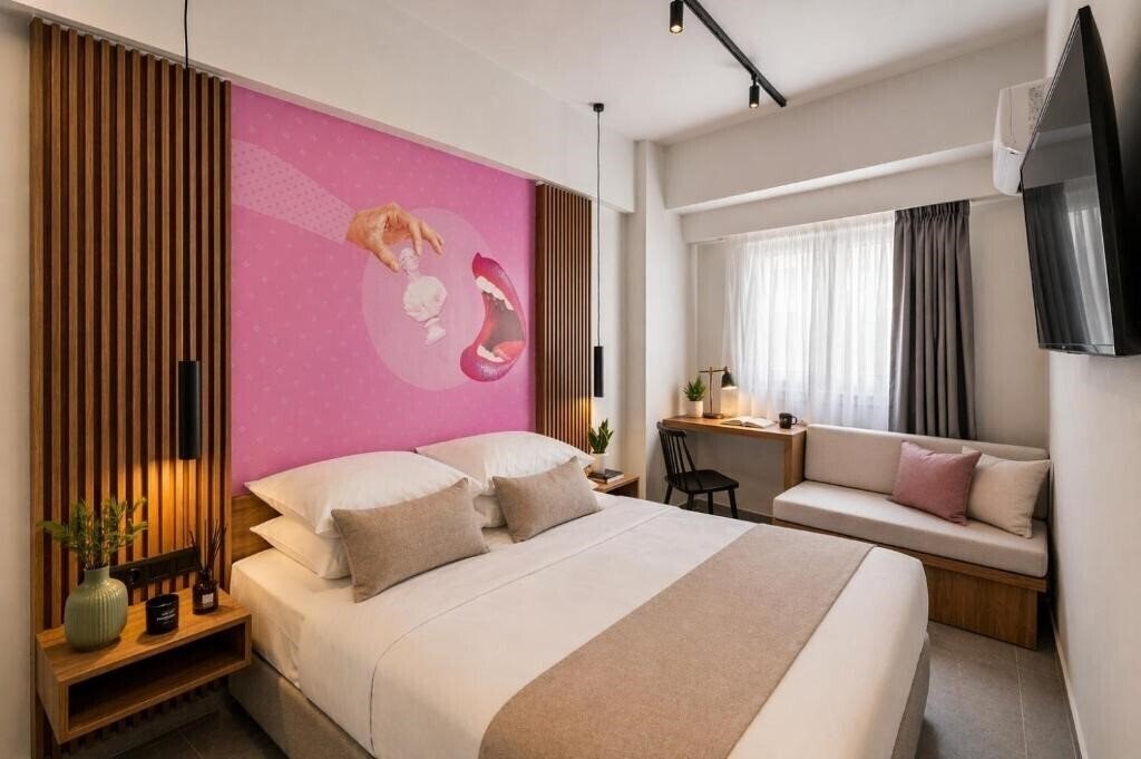 Фото The Q Hotel 3*