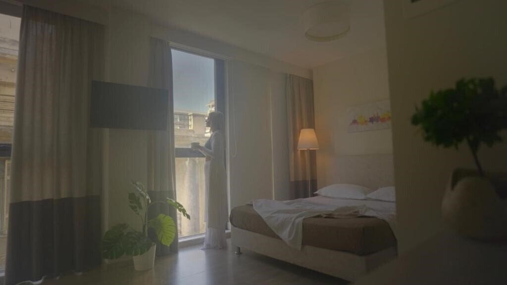 Отель Tins Boutique Suites 3*