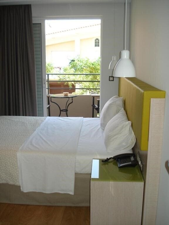 Отель Elements Rooms & Apartments 4*