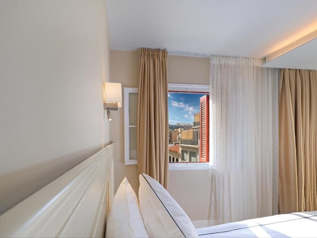 Отель Vrachos Athens Suites 5*