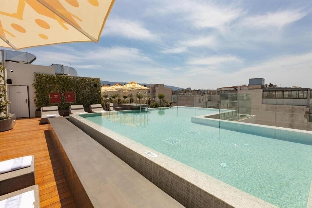 Отель Adia Aluma Athens, Curio Collection by Hilton 4*