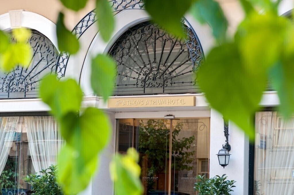 Отель Athens Atrium 4*