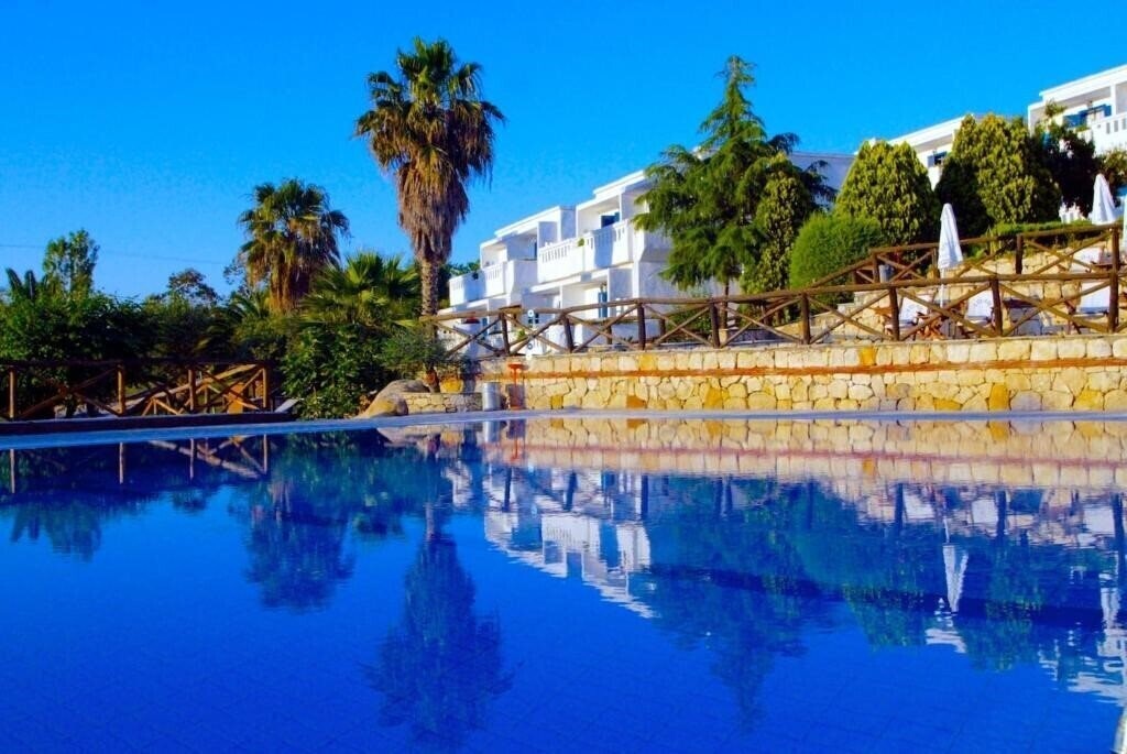 Отель Agionissi Resort 4*