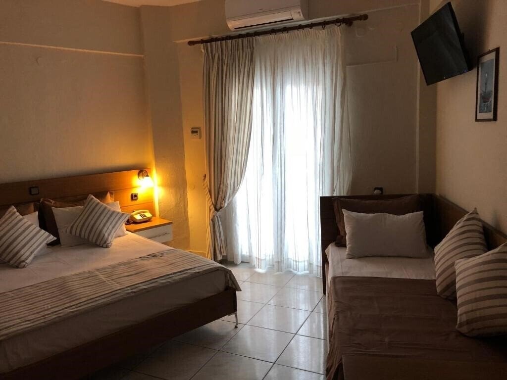 Фото Ammouliani Hotel 3*