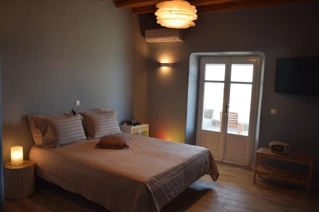 Фото Andromeda Mykonos Villas & Suites 4*
