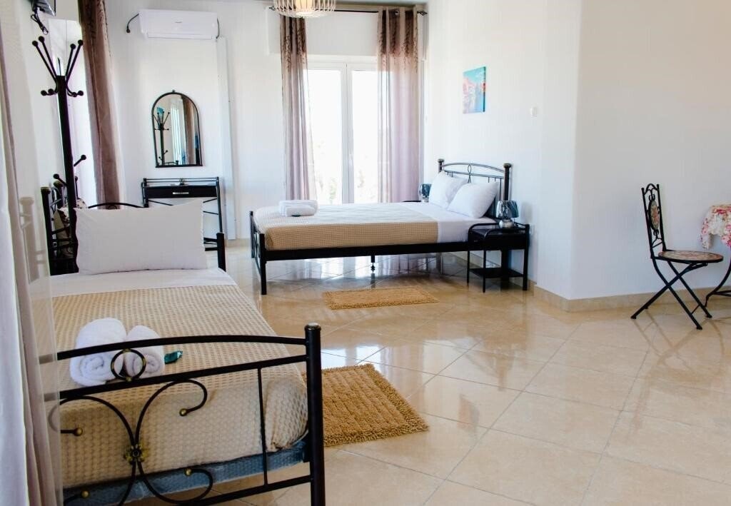 Фотография Nikolakakis Rooms Lavrio 3*