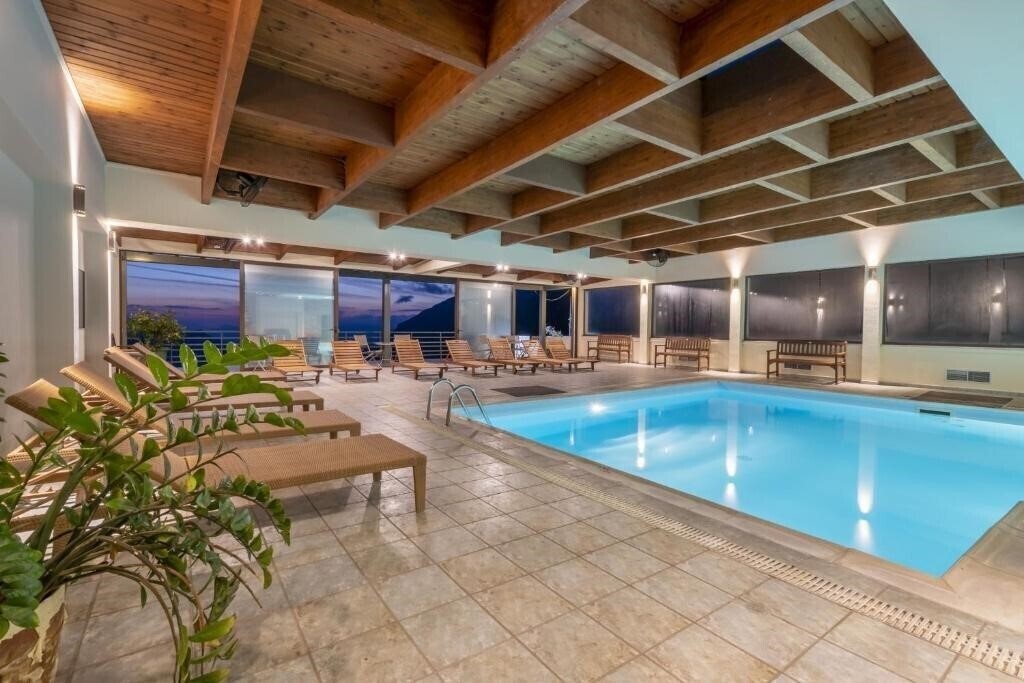 Фотографія Anemolia Mountain Resort Arachova 4*