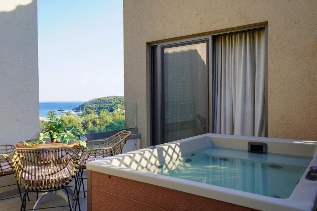 Изображение Golden Bay Suites And Maisonettes (Parga) 4*
