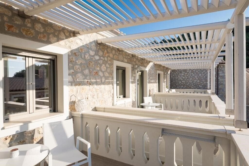 Фото Anemolia Hotel & Stylish Suites 4*