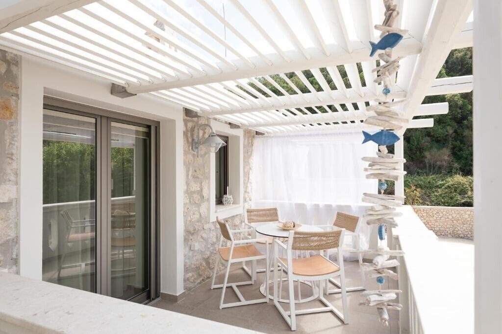 Фотография Anemolia Hotel & Stylish Suites 4*
