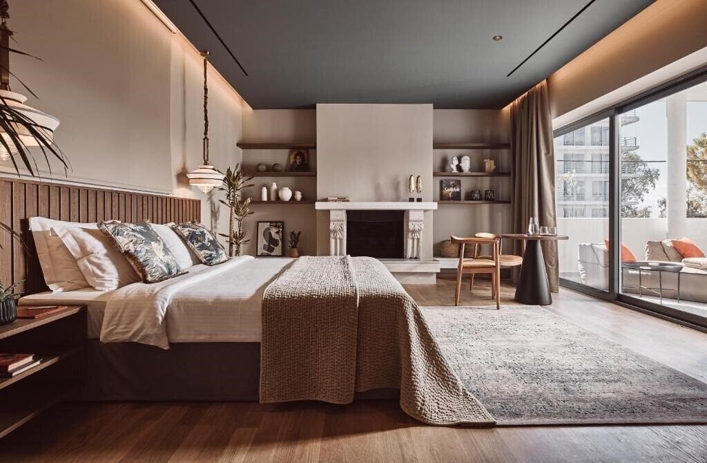 Фотография Cama Luxury Suites Glyfada 3*