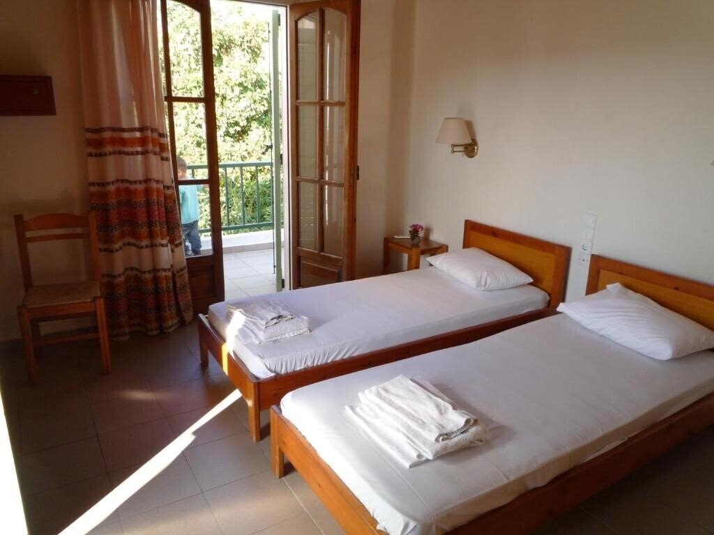 Готель Haris Apartments апартаменты