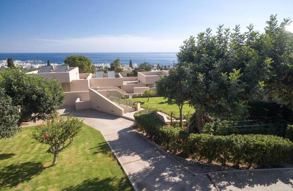 Отель Sundance Apartments & Suites 4*