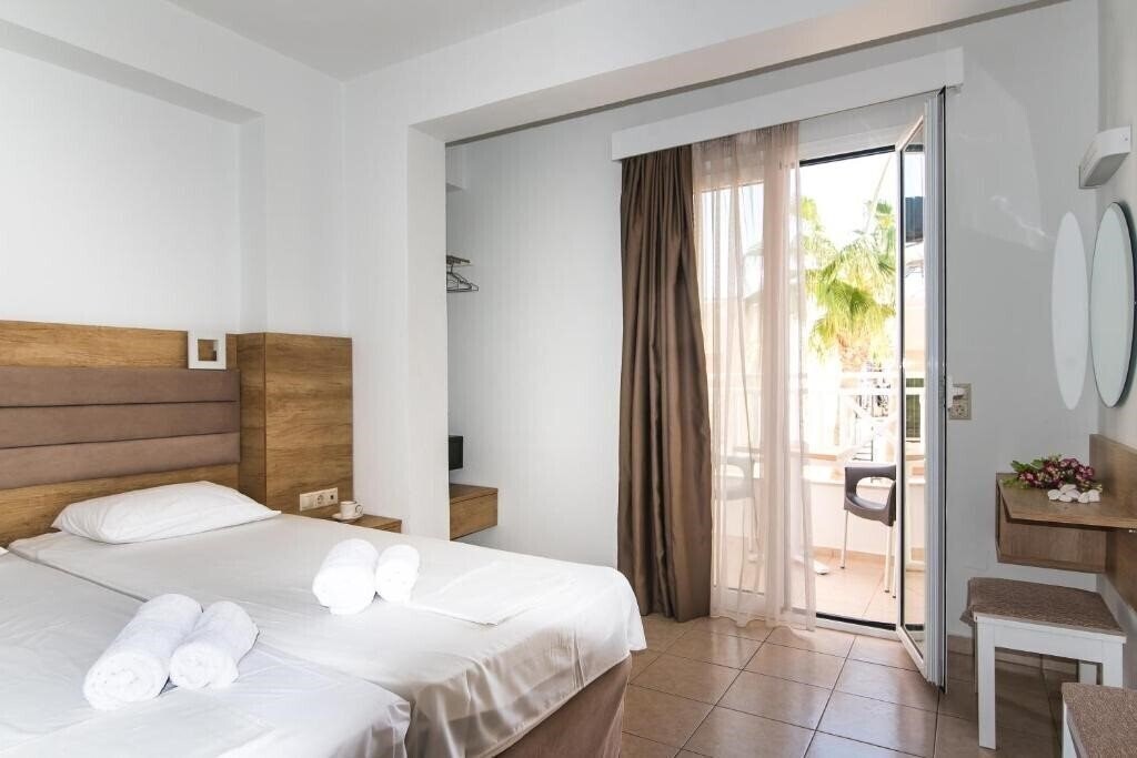 Фото Vagelis Studios & Apartments 3*