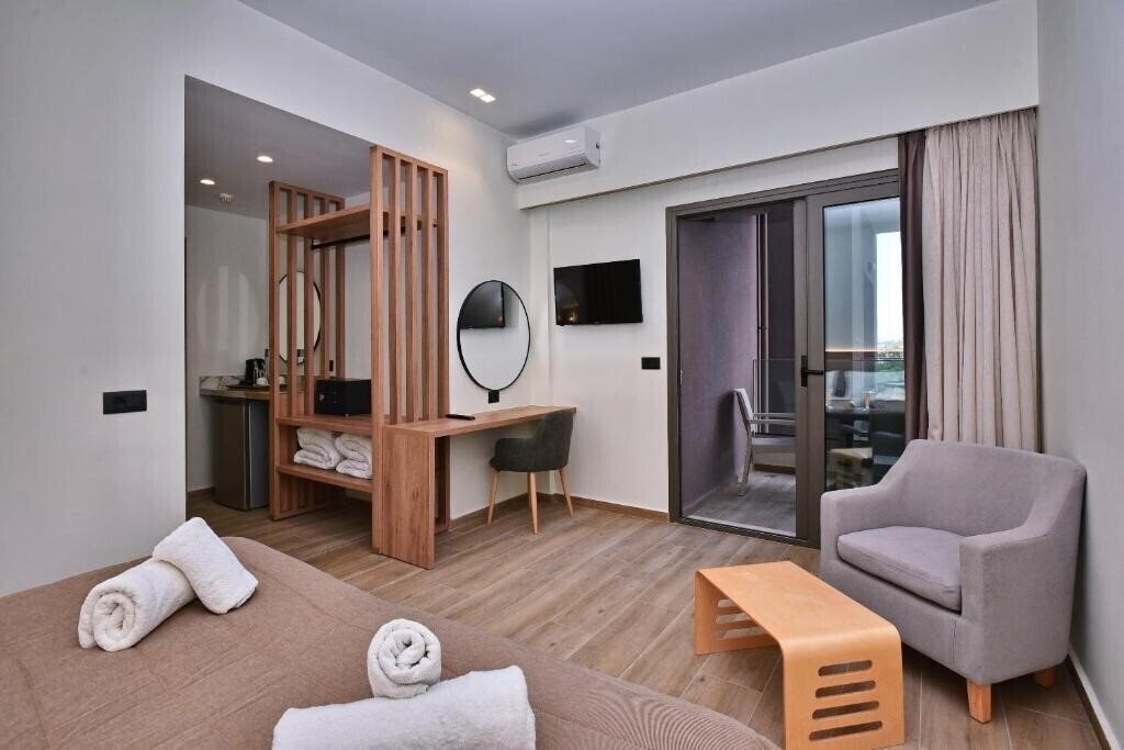 Фотографія Dionyssos Hotel 4*