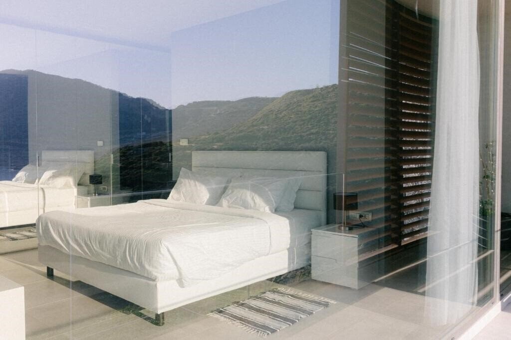 Фото Rock Bay Villas + 4*