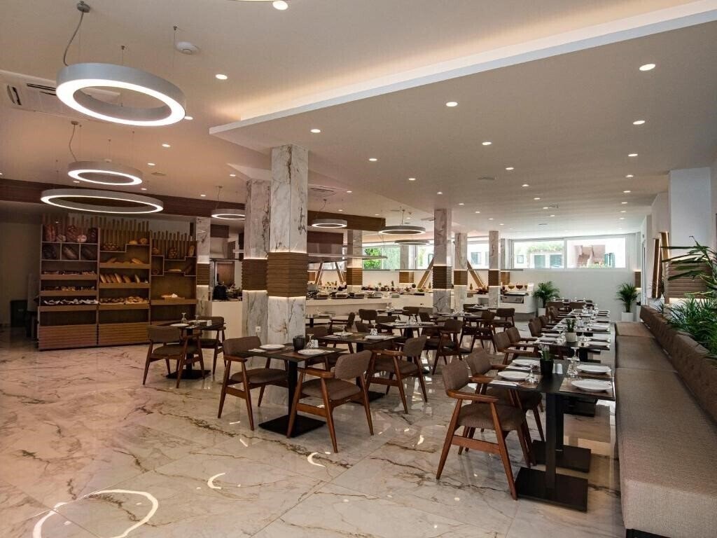 Фото Porto Greco Village Beach Hotel 4*