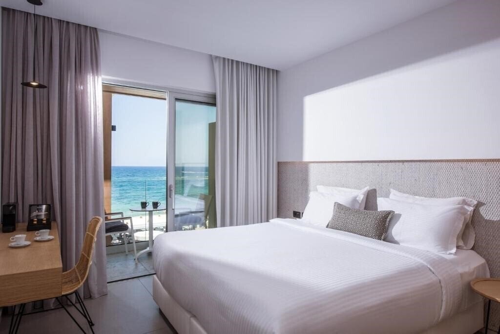Фото Enorme Ammos Beach 5*